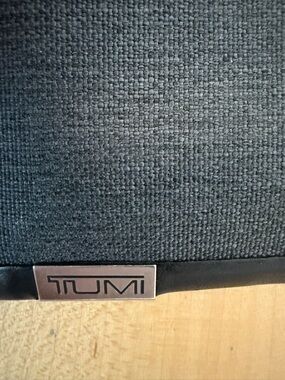 Tumi Black Textured Canvas Accessory with Silver Logo Plate